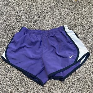 Purple Nike shorts dry fit size medium no rips no tears no stains.